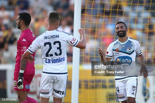 Fahid Ben Khalfallah of the Victory celebrates a goal with team mate Jai Ingham during the round 22 A-League match between the Central Coast Mariners...