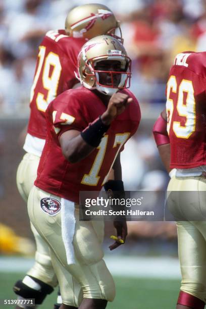 Quarterback Charlie Ward of the Florida State Seminoles calls out the play during an NCAA game against the Clemson Tigers on September 11, 1993 at...