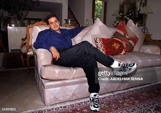 Prince Hicham, cousin of Moroccan King Mohammed VI, poses at home in Rabat, March 2000. Le prince Hicham, cousin du roi du Maroc Mohammed VI, pose...