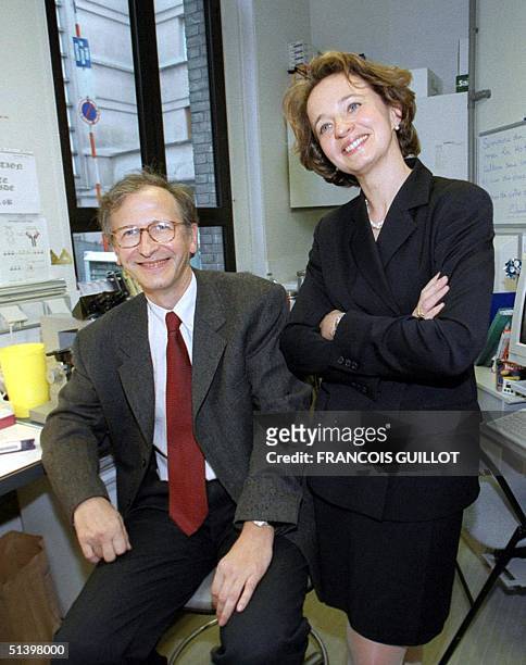 French doctors Alain Fischer and Marina Cavazzana-Calvo pose for photographer, 27 April 2000 at Necker children's hospital in Paris. The two doctors...