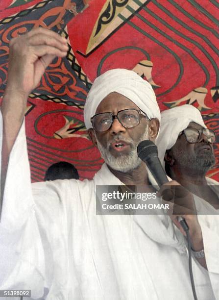 Sudan's veteran Islamist ideologue Hassan al-Turabi addresses the public during a meeting with his follower in his Khartoum home 07 May 2000. Turabi...