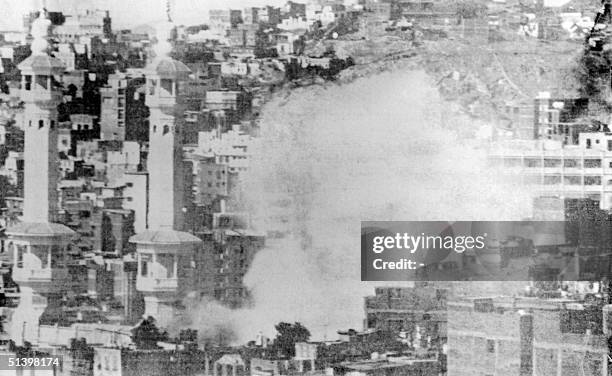 Picture dated November 1979 of burning Mecca's Great Mosque, the home of Islam's holiest sites, attacked 20 November 1979 by Moslem gunmen belonging...