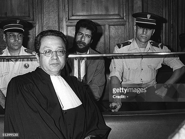 The picture shows Lebanese Georges Ibrahim Abdallah, during his trial at the courthouse of Lyon, 3 July 1986 with his lawyer Jacques VergFs. Abdallah...