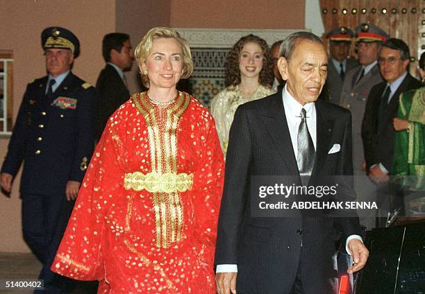 Clad in a traditional outfit, the caftan, US First Lady Hillary Clinton and her daughter Chelsea are accompanied by King Hassan II of Morocco as they...