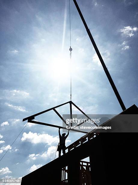 house under construction. - roof truss stock pictures, royalty-free photos & images