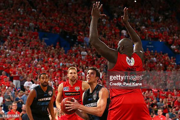 Thomas Abercrombie of the Breakers drives to the basket against Nate Jawai of the Wildcats during game three of the NBL Grand Final series between...