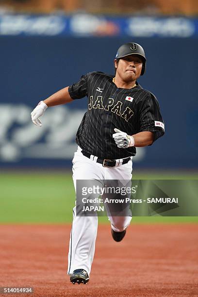 Outfielder Ryosuke Hirata of Japan runs to the third base after hitting a triple in the top of ninth inning during the international friendly match...