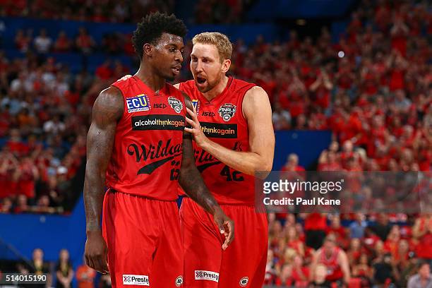 Shawn Redhage of the Wildcats talks with Casey Prather during game three of the NBL Grand Final series between the Perth Wildcats and the New Zealand...