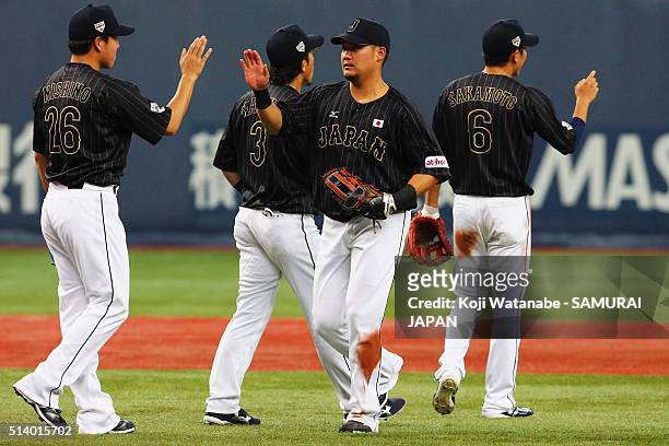 Outfielder Yoshitomo Tsutsugo of Japan celebrates his team's win in the international friendly match between Japan and Chinese Taipei at the Kyocera...