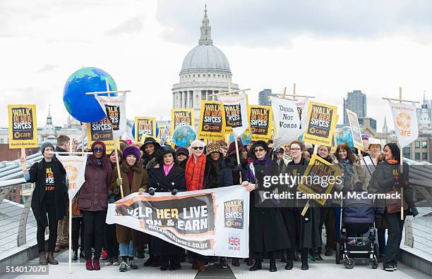 Annie Lennox, Bianca Jagger and Helen Pankhurst take part in 'Walk In Her Shoes' on March 6, 2016 in London, England.