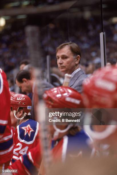 Head coach Viktor Tikhonov of CSKA Moscow looks on from behind the bench during the game against the New York Islanders on December 29, 1988 at the...