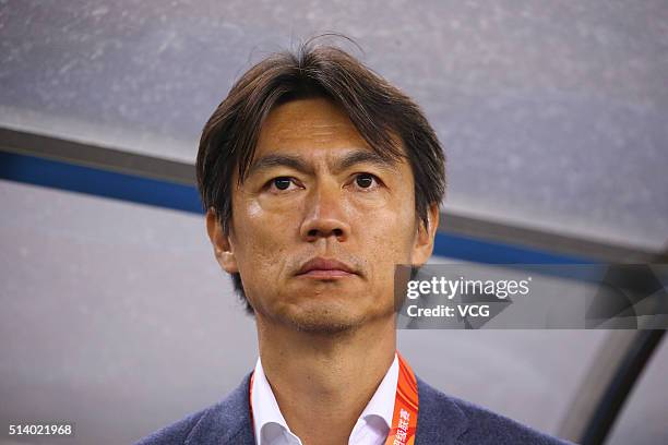 Hong Myung-bo, head coach of Hangzhou Greentown, reacts during the first round match of CSL Chinese Football Association Super League between...