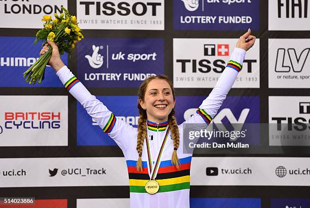 Laura Trott of Great Britain celebrates on the medal podium after winning the Women's Omnium during Day Five of the UCI Track Cycling World...