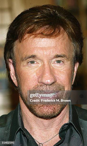 Actor Chuck Norris poses during a book signing for his new book "Against All Odds" at Borders Books on October 4, 2004 in Northridge, California. .