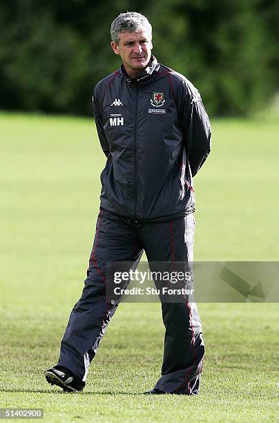 Welsh manager Mark Hughes looks on during Wales Football training ahead of the World Cup qualifying match against England at Glamorgan Playing Fields...