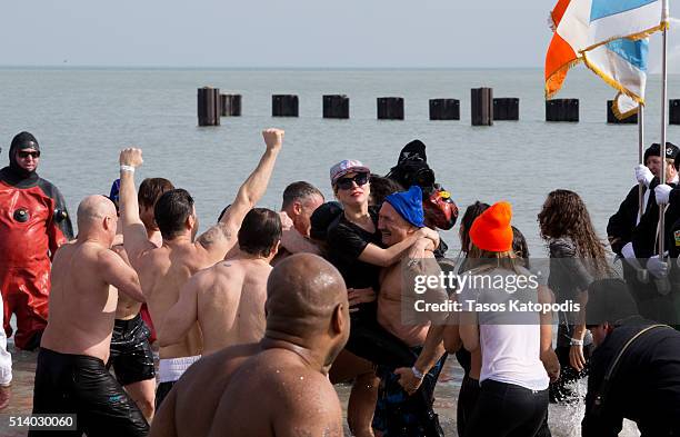 Lady Gaga and Taylor Kinney take part in the 16th Annual Polar Plunge at North Avenue Beach on March 6, 2016 in Chicago, Illinois.