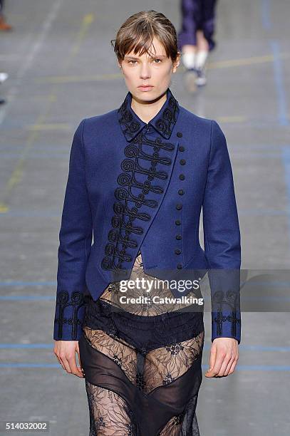 Model walks the runway at the John Galliano Autumn Winter 2016 fashion show during Paris Fashion Week on March 6, 2016 in Paris, France.