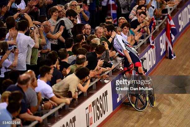 Sir Bradley Wiggins of Great Britain celebrates winning the Mens Madison Final with his family during Day Five of the UCI Track Cycling World...