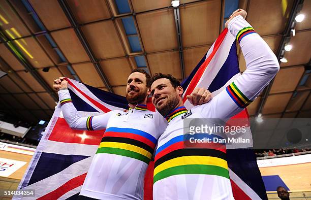 Mark Cavendish and Sir Bradley Wiggins of Great Britain celebrate after winning The Men's Madison Final during Day Five of the UCI Track Cycling...
