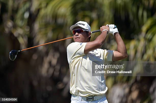 Hideki Matsuyama of Japan tees off on the eighth hole during the final round of the World Golf Championships-Cadillac Championship at Trump National...