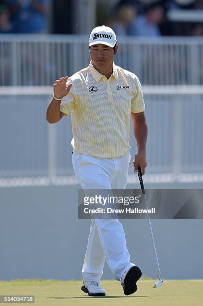 Hideki Matsuyama of Japan reacts to his birdie on the ninth hole during the final round of the World Golf Championships-Cadillac Championship at...