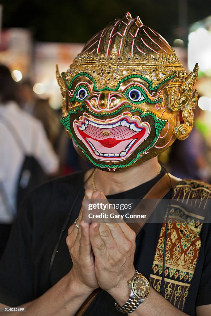 Thai dancer in folklore mask