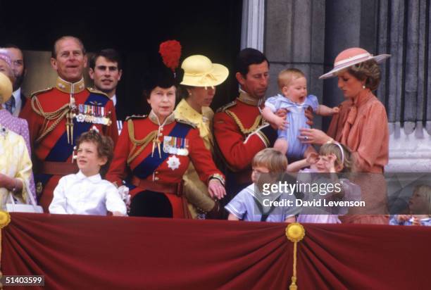 Queen Elizabeth II with Prince Phillip, Lord Nicholas Windsor, Prince Edward, Princess Anne, Prince Charles passing Prince Harry, Diana, Princess of...