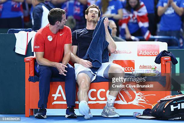 Andy Murray of Great Britain looks exhausted following the singles match against Kei Nishikori of Japan on day three of the Davis Cup World Group...