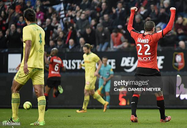 Rennes' French defender Sylvain Armand celebrates at the end of the French L1 football match between Rennes and Nantes on March 6, 2016 at the...