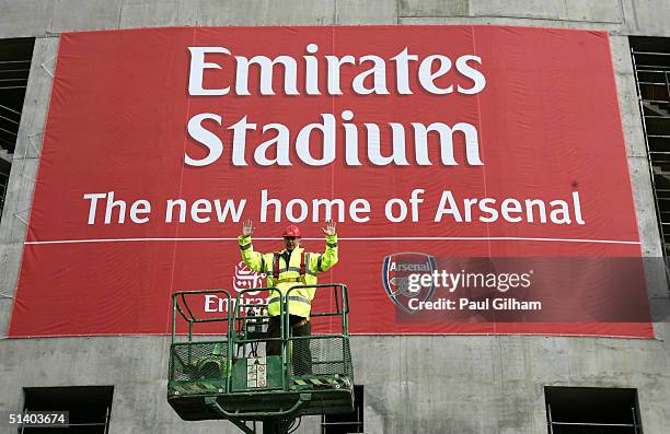 Manager Arsene Wenger of Arsenal poses outside Arsenal Football Club's new Emirates Stadium development at Ashburton Grove on October 5, 2004 in...