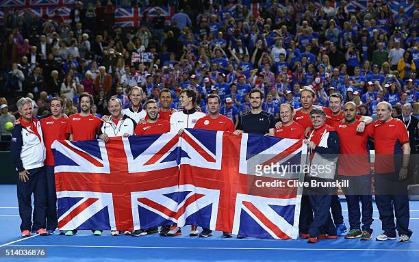 The victorias Great Britain team pose with the Union Jack following the singles match against Kei Nishikori of Japan on day three of the Davis Cup...