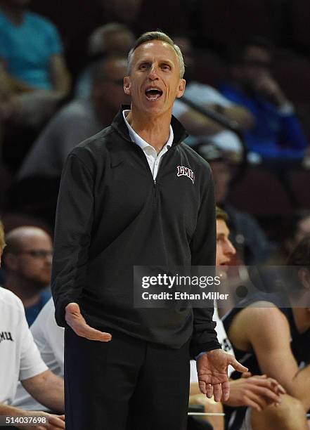 Head coach Mike Dunlap of the Loyola Marymount Lions questions an official's call during a quarterfinal game of the West Coast Conference Basketball...