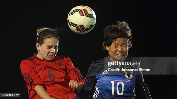 Rieke Diekmann of Germany and Rika Masuya of Japan fight for the ball during the women's U23 international friendly match between WU20 Germany and...