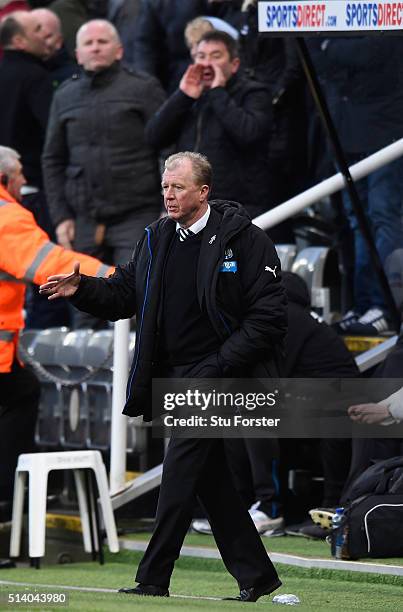 Newcastle manager Steve McClaren looks on as the home support suggest it may be time to go during the Barclays Premier League match between Newcastle...