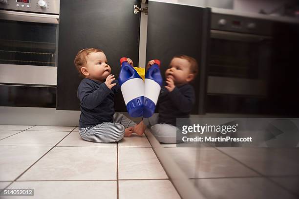 baby bleach kitchen danger - poisonous stock pictures, royalty-free photos & images
