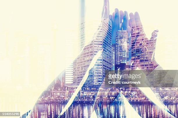 group of workers high fiving. - double exposure business stock pictures, royalty-free photos & images