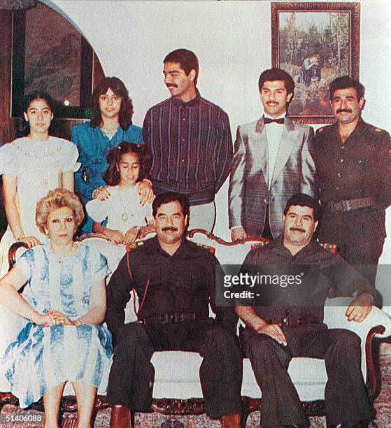Iraqi President Saddam Hussein surrounded by his family in Bagdad: his first wife, Sajiba and his daughters Hala , Rana and Raghad ; Hussein's...