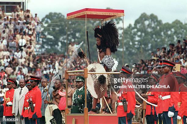 Swaziland new King Mswati III, who succeeded his father King Sobhuza II, who died in 1982 at the age of 82, salutes the crowd during his coronation...