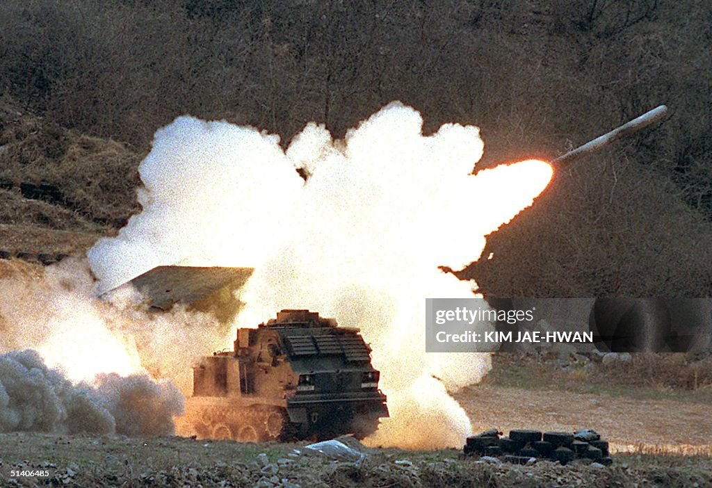Mlrs Us Rockets US Multiple Launch Rocket System launches a rocket into the air at a ...