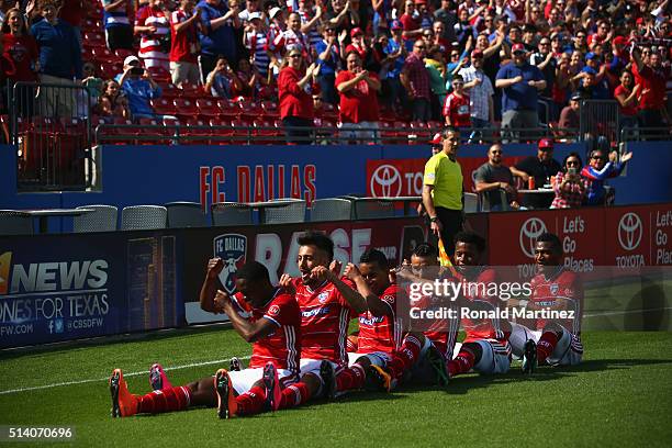 Fabian Castillo of FC Dallas, front celebrates his goal with the team against the Philadelphia Union in the first half during the MLS opening game at...