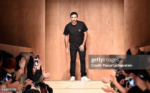 Designer Riccardo Tisci is seen on the runway during the Givenchy show as part of the Paris Fashion Week Womenswear Fall/Winter 2016/2017 on March 6,...