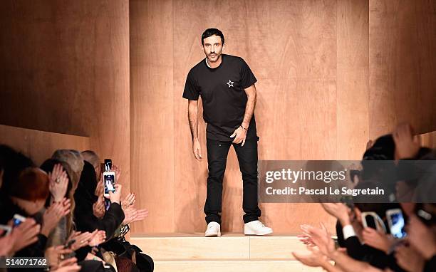 Designer Riccardo Tisci is seen on the runway during the Givenchy show as part of the Paris Fashion Week Womenswear Fall/Winter 2016/2017 on March 6,...