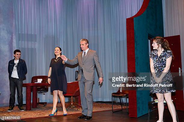 Actors of the play Mathias Huguenot, Alexandra Sarramona, David Brecourt and Camille Aguilar acknowledge the applause of the audience at the end of...