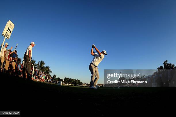 Adam Scott of Australia tees off on the 18th hole during the final round of the World Golf Championships-Cadillac Championship at Trump National...