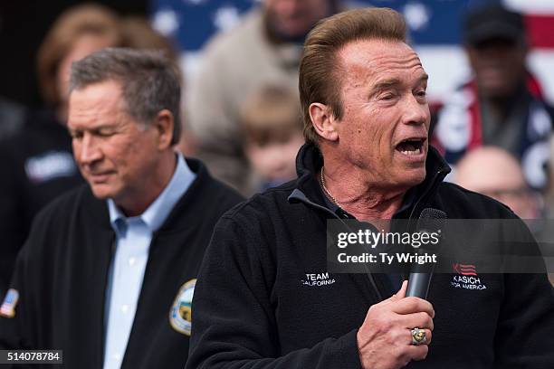 Former California Governor Arnold Schwarzenegger speaks to a crowd during a campaign rally for Ohio Governor John Kasich at the Wells Barns at the...
