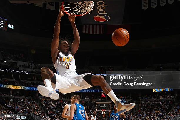 Kenneth Faried of the Denver Nuggets dunks the ball against the Dallas Mavericks at Pepsi Center on March 6, 2016 in Denver, Colorado. NOTE TO USER:...