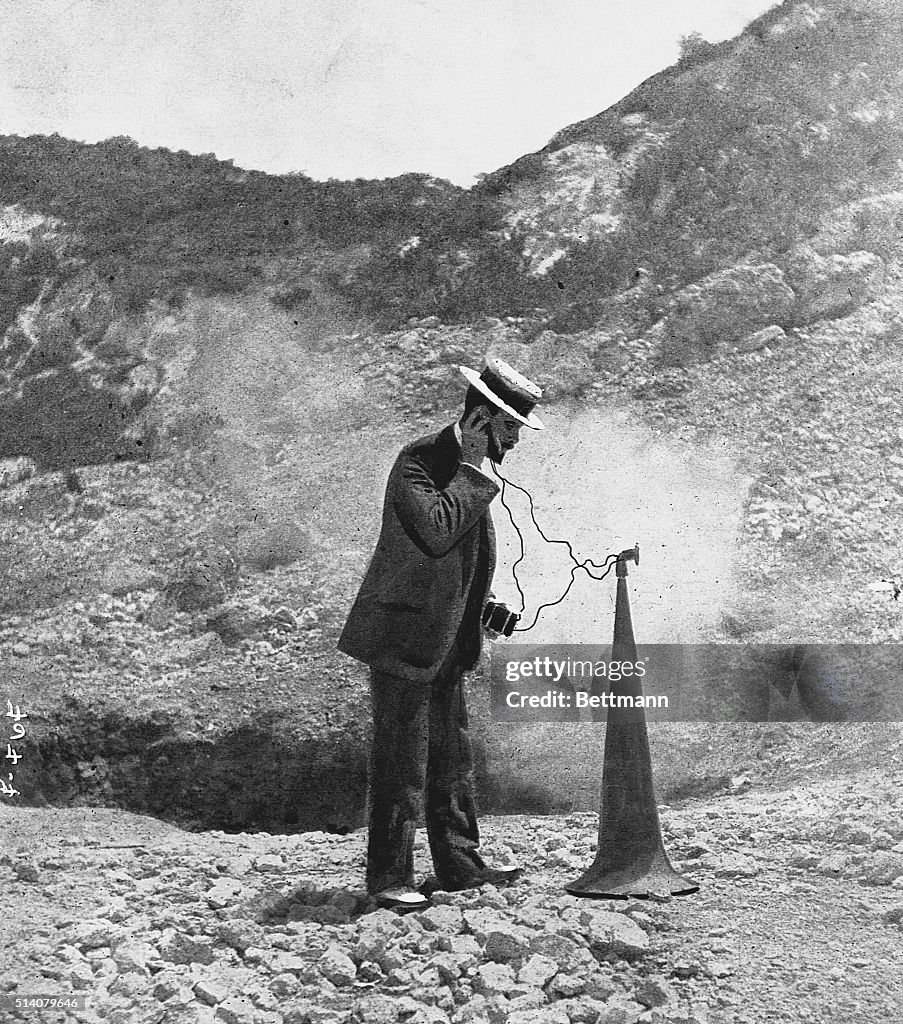 Early Seismologist Listening to Volcano
