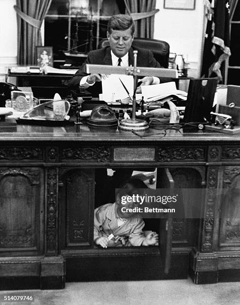 John F. Kennedy Jr. Exploring His Father's Desk