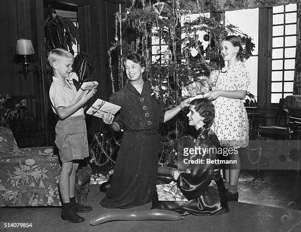 Eleanor Roosevelt enjoys Christmas with her daughter Anna Roosevelt Boettiger, grandson Curtis Dall, and granddaughter Anna Dall in Seattle,...