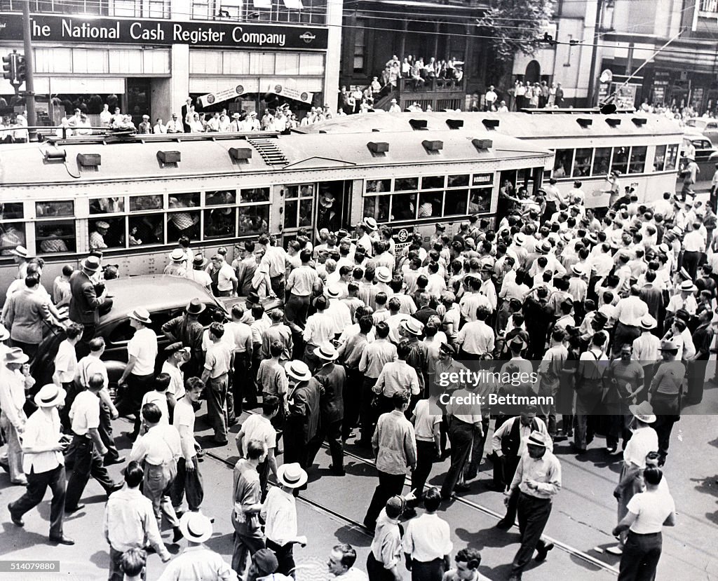 Street Mob Racing An angry white mob surrounds a street car with African American... News ...